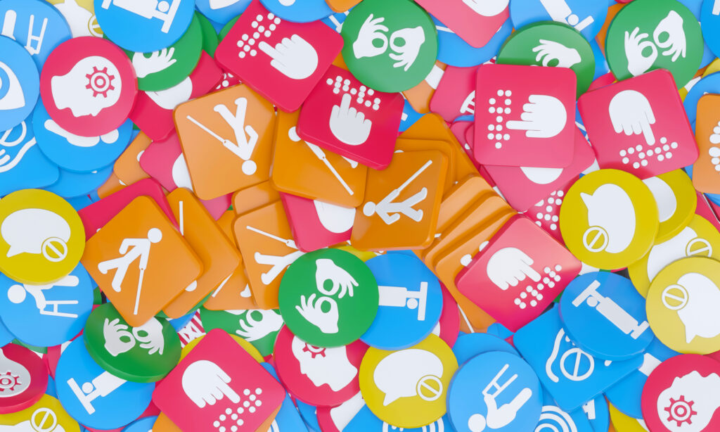 A pile of colorful accessibility icons including braille, sign language, and mobility aids