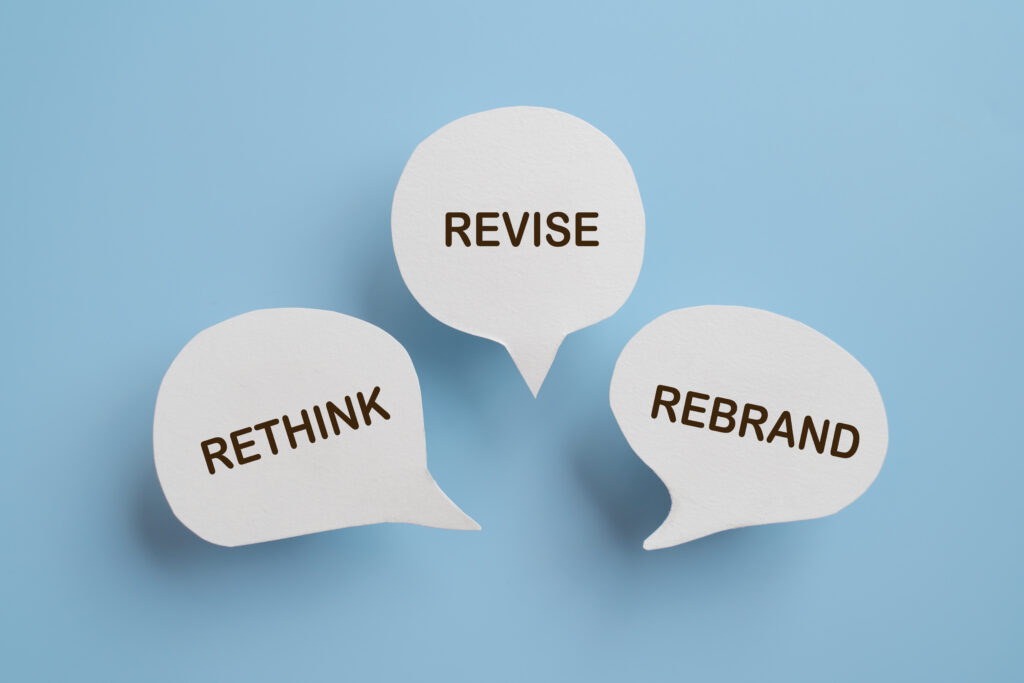 Rethink revise and rebrand speech bubbles representing the business rebranding process